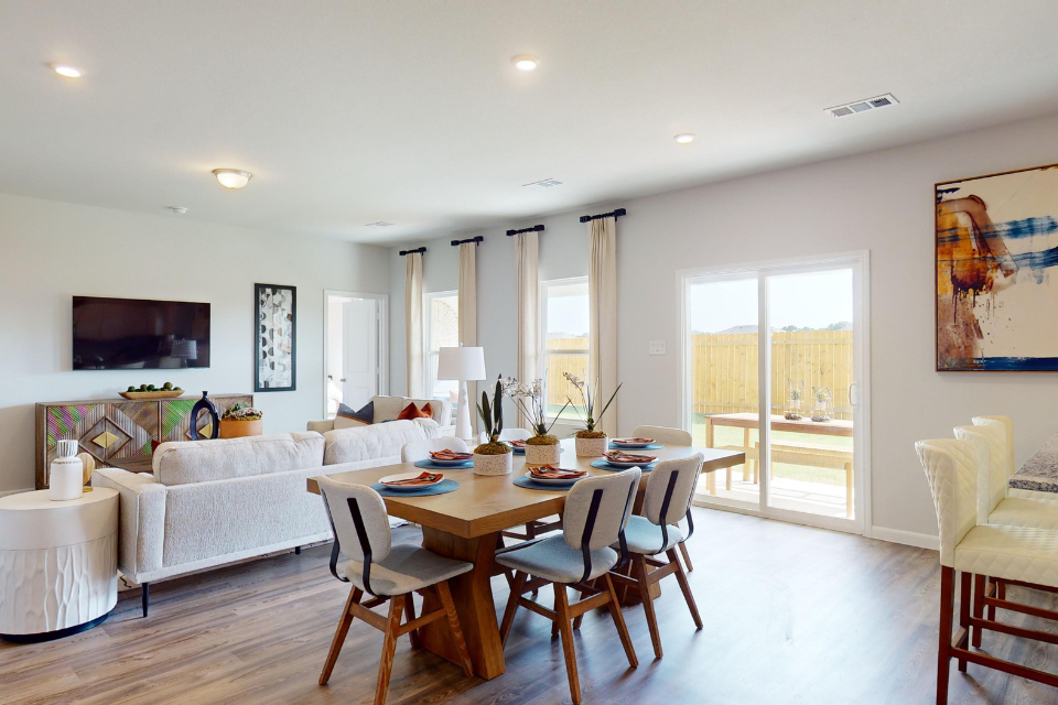 A living room with a large window.