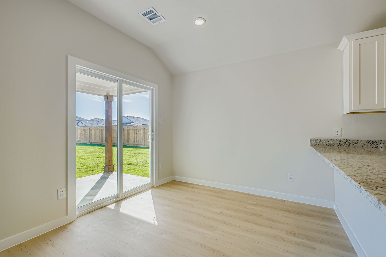 A kitchen and living room.