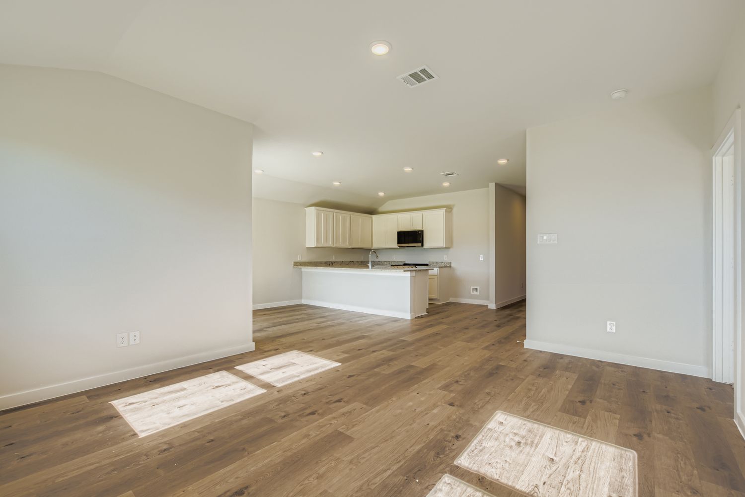 A large empty living room.