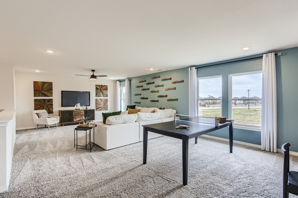A living room with a large window.