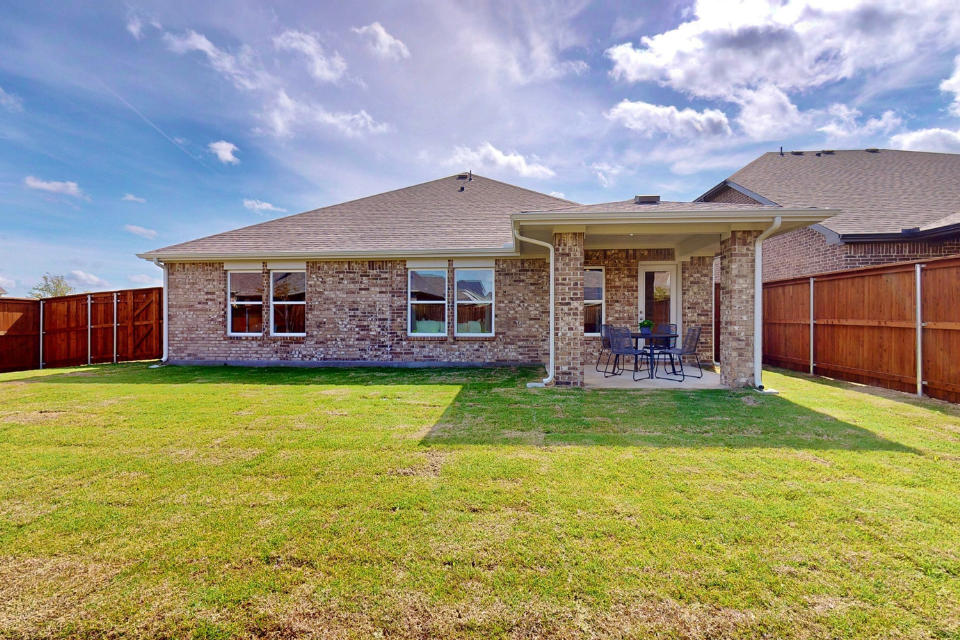 A house with a lawn.