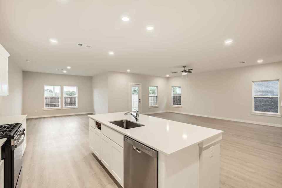 A kitchen with a large island.