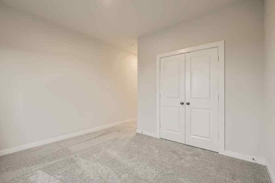 A room with white doors.