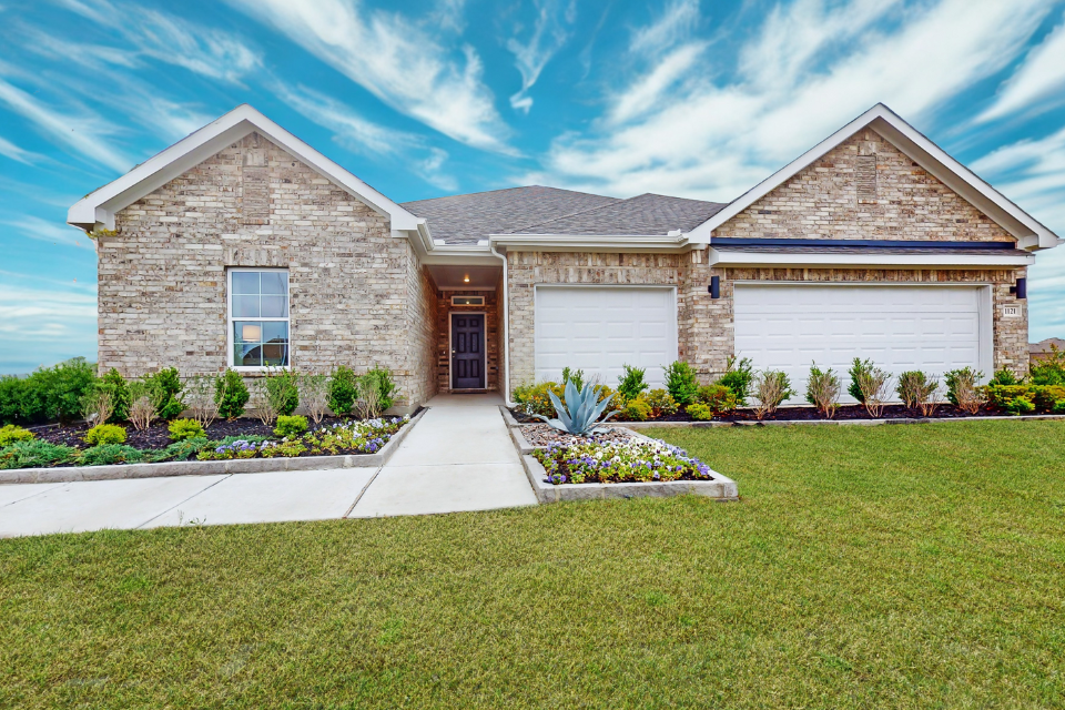 A house with a large front yard.