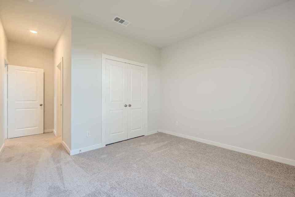 A room with white doors.