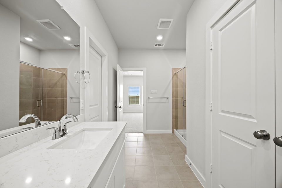 A bathroom with a tub and sink.