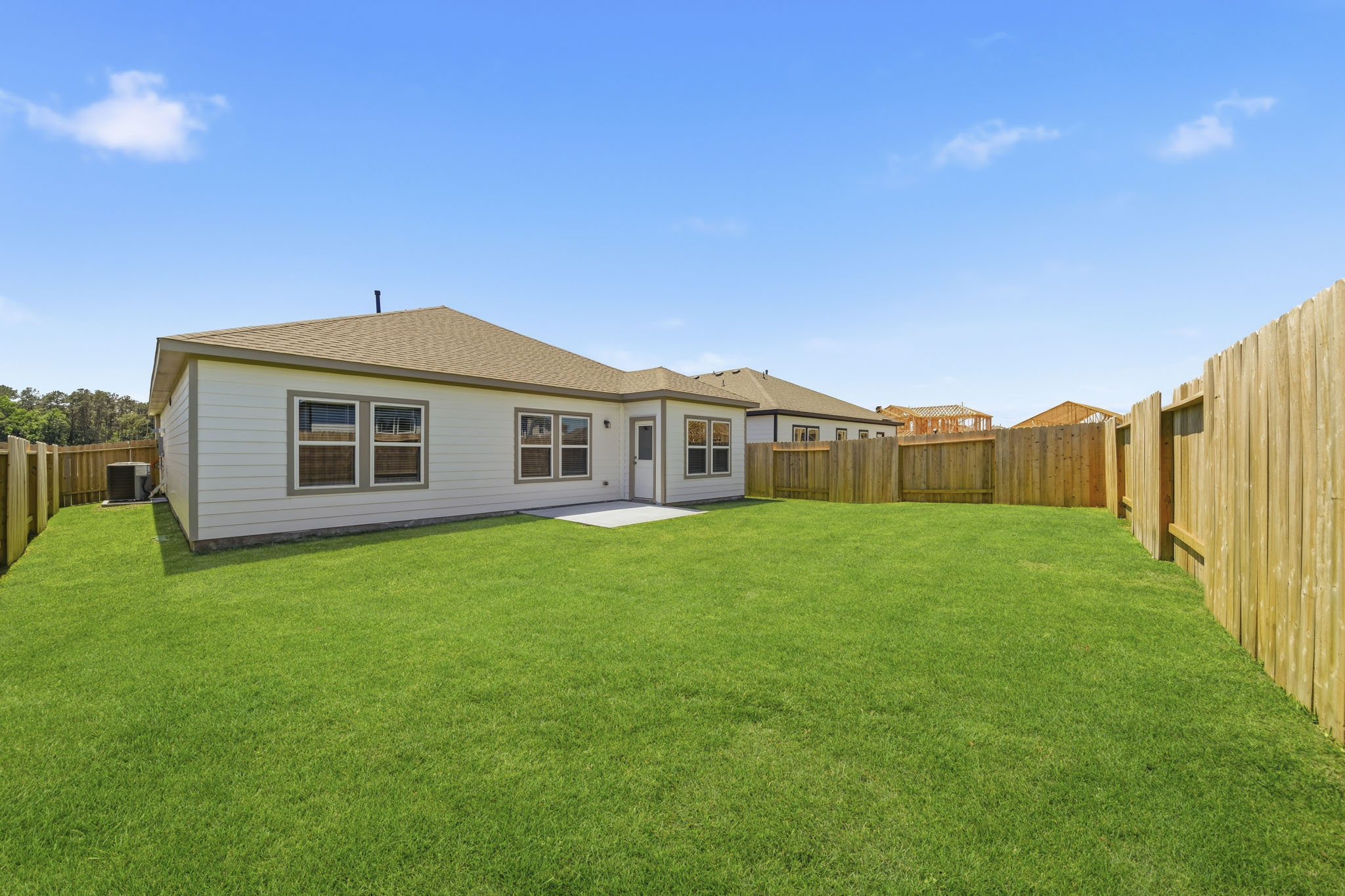 A house with a fence around it.