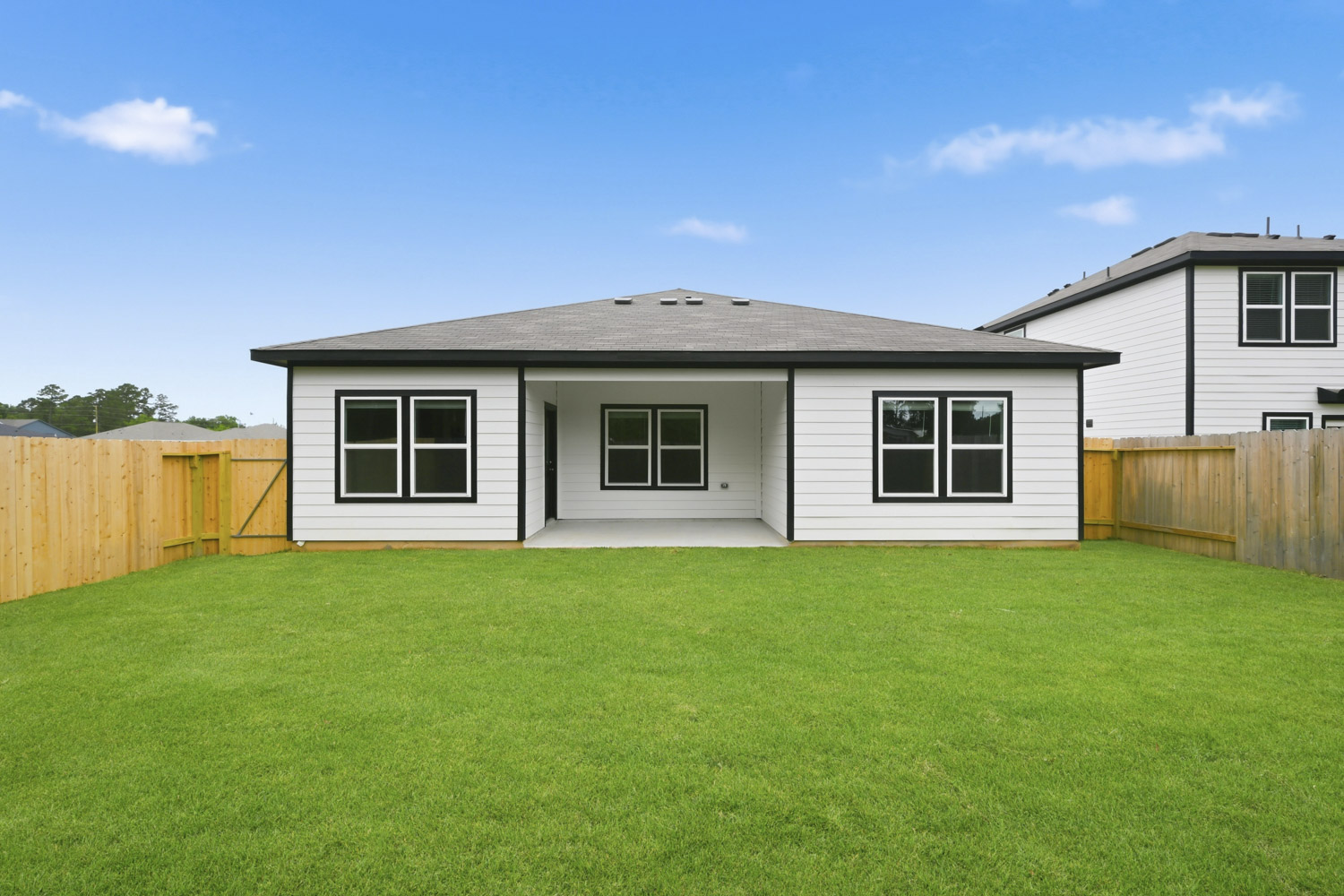 A house with a fence around it.