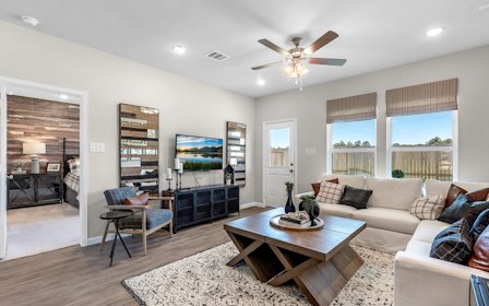 A living room with a large window.