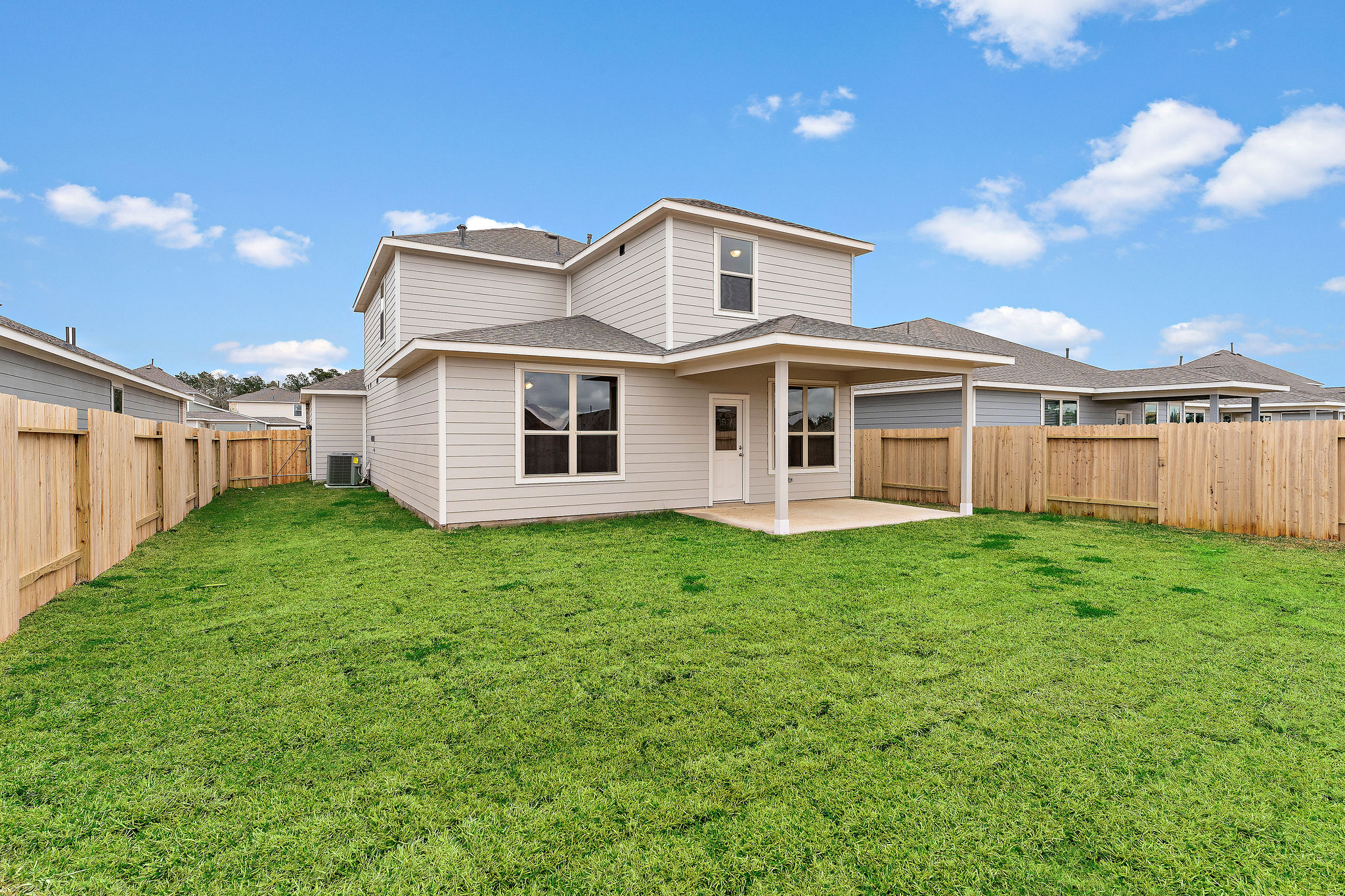 A house with a fence around it.