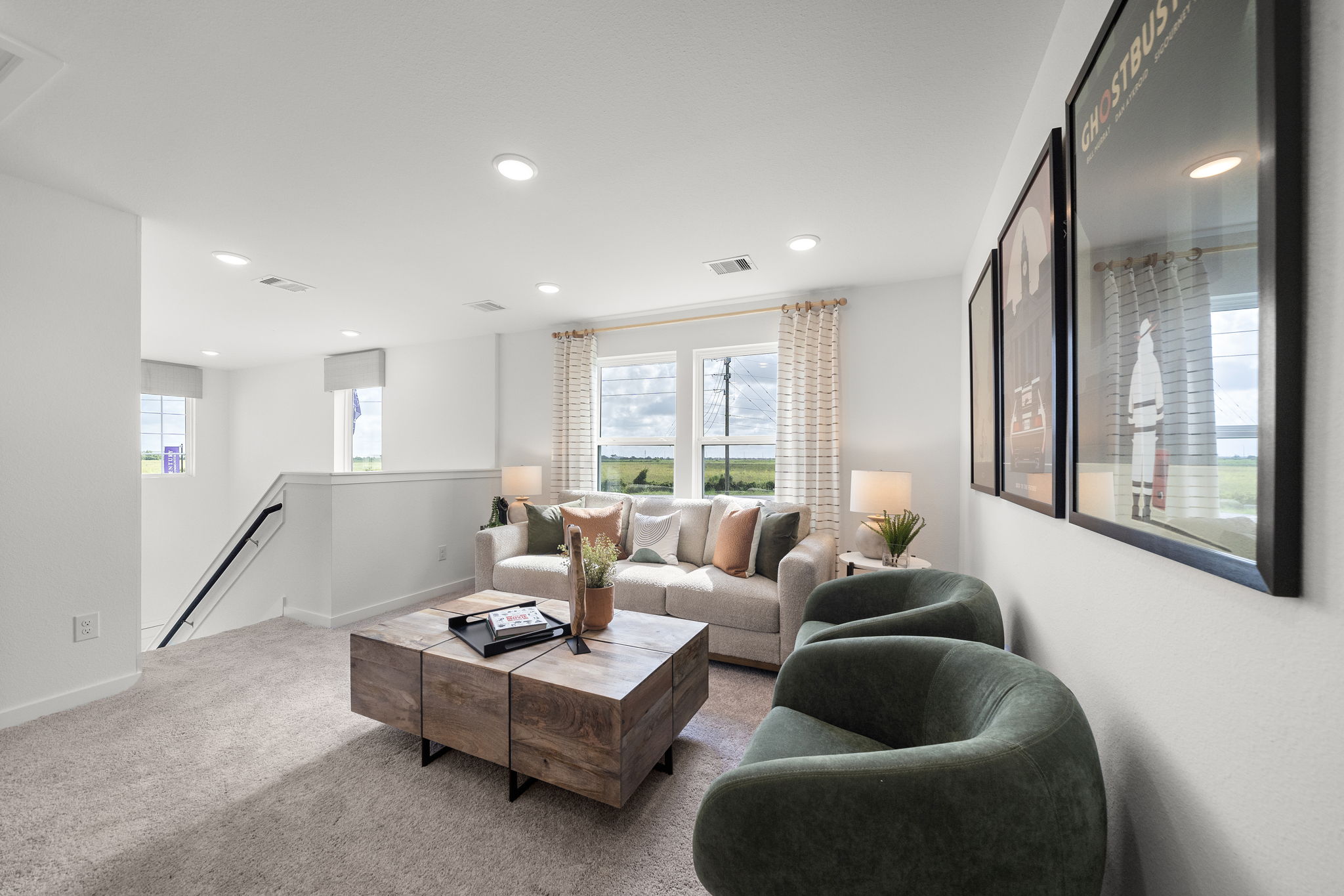 A living room with a large window.