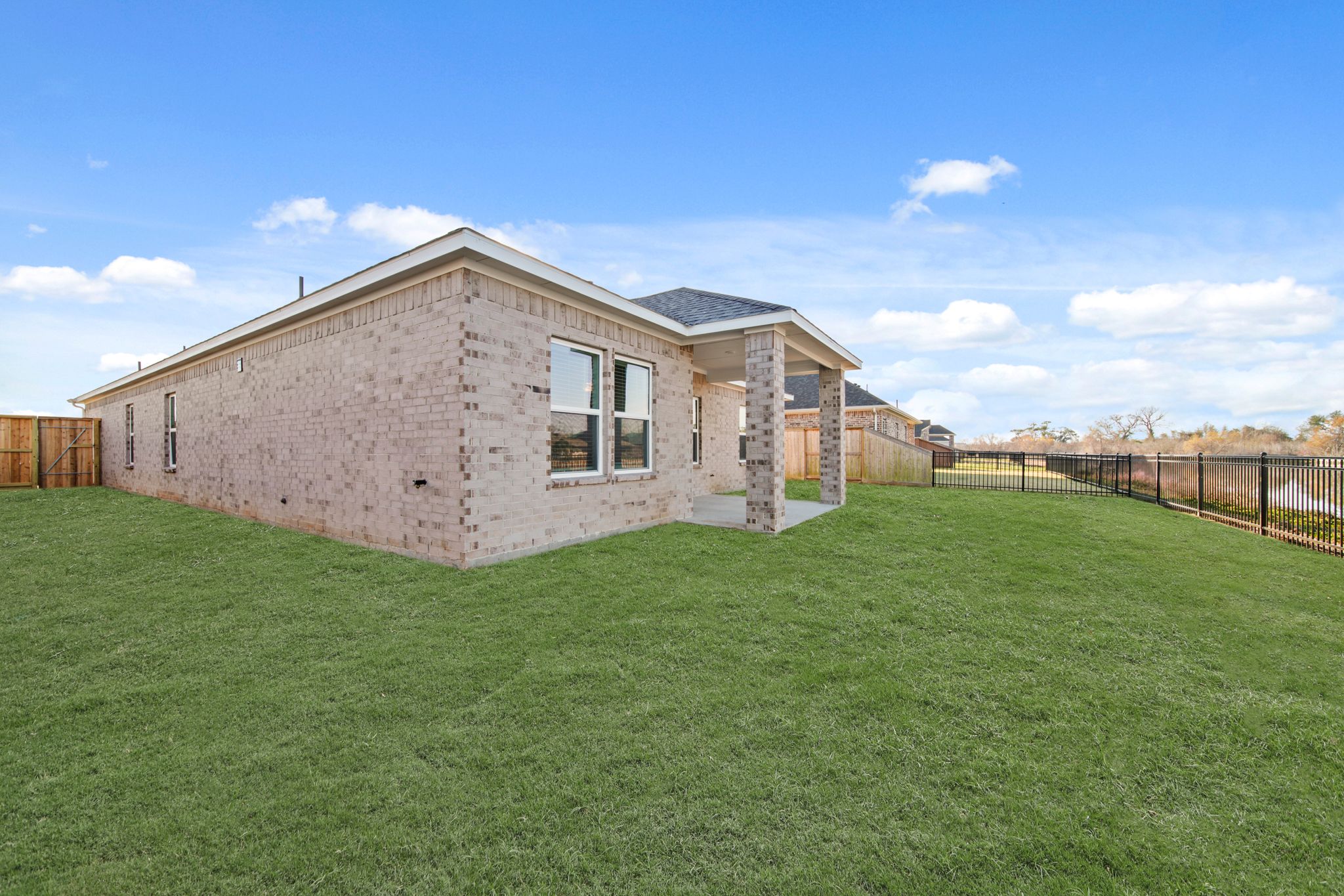 A house with a fence around it.