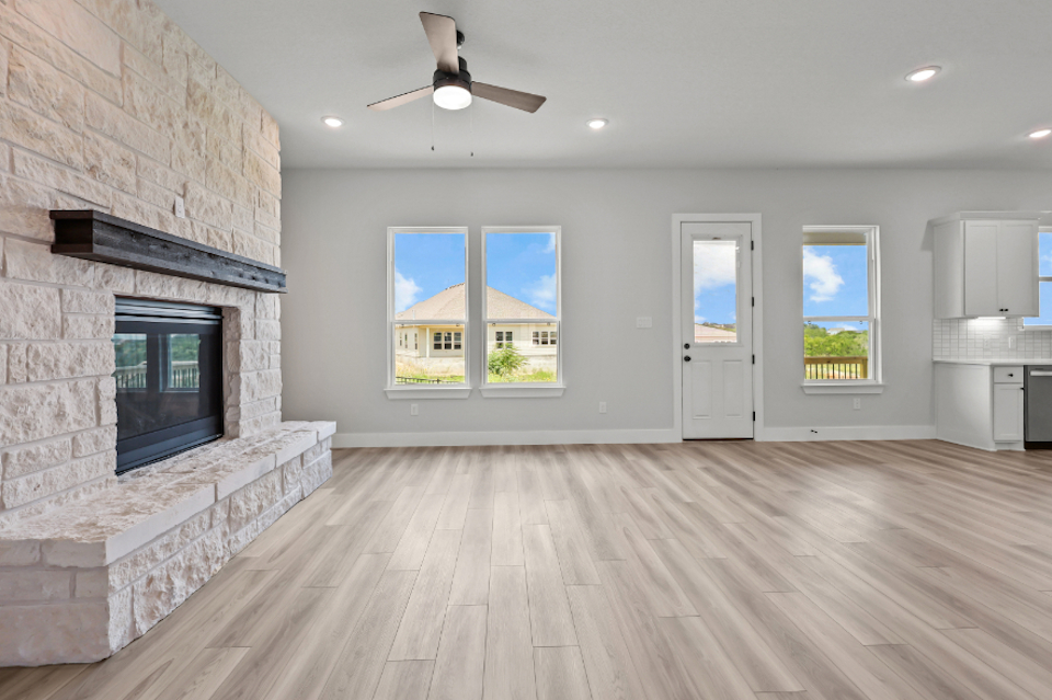 A living room with a fireplace.