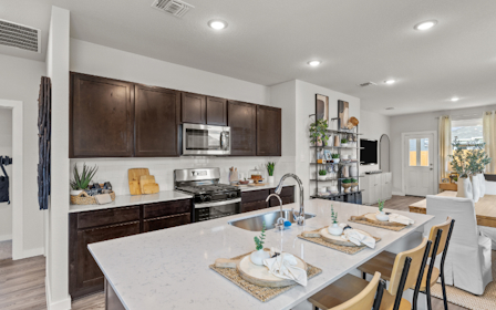 A kitchen with a large island.