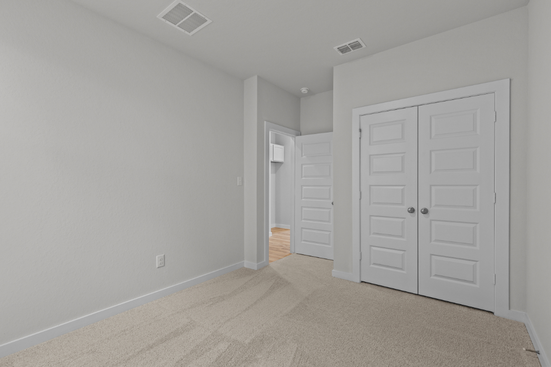 A room with white doors.