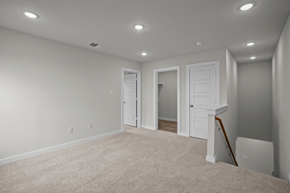 A room with white doors.