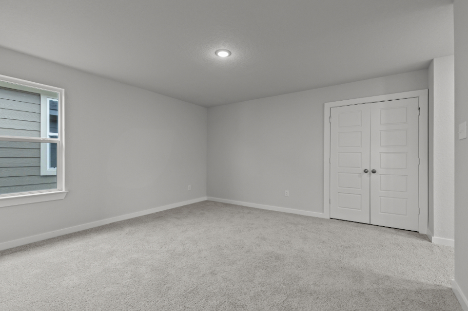 A room with white doors.
