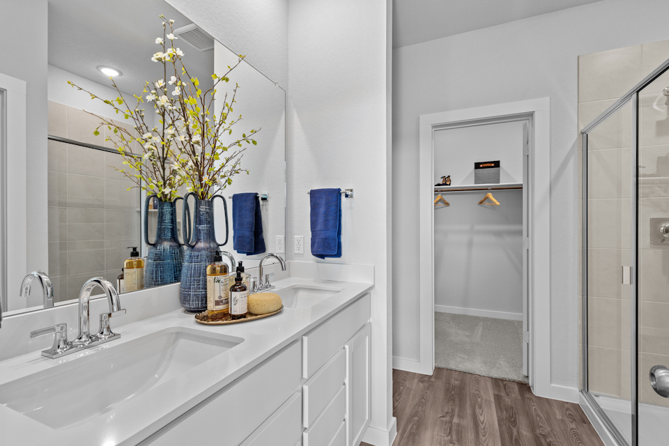 A bathroom with a glass shower.