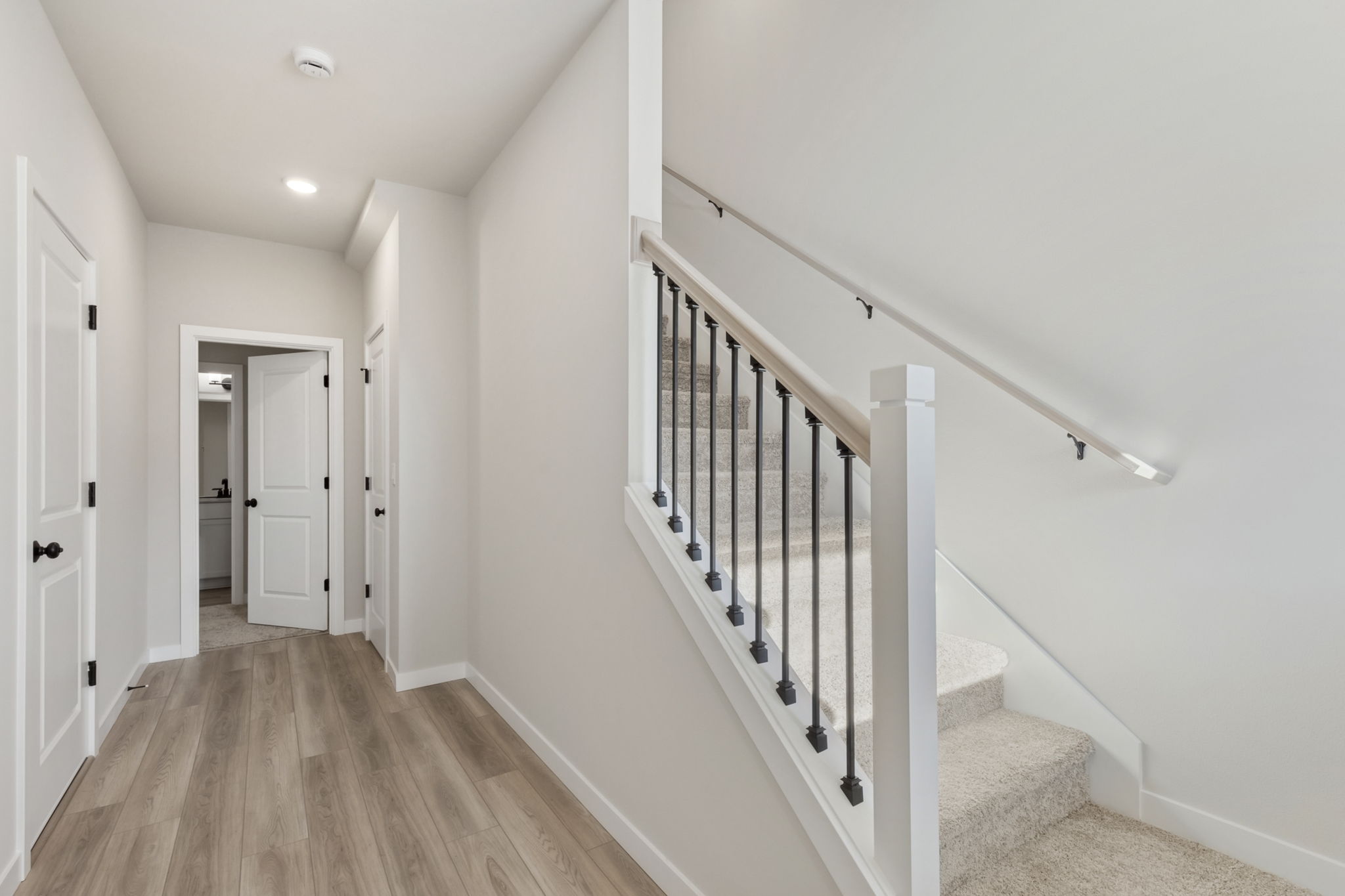 A white staircase in a house.