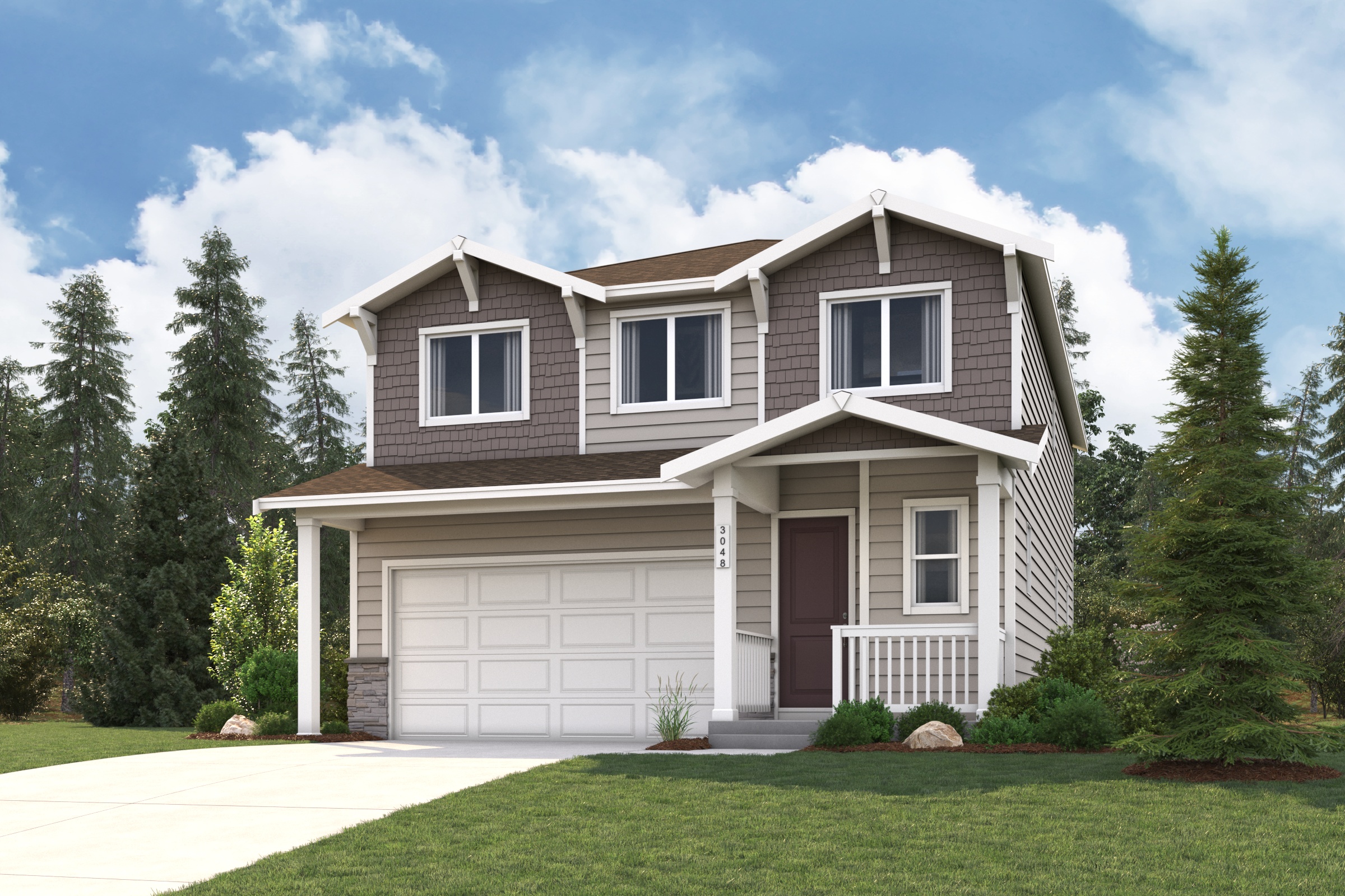 A house with a garage and trees in the back.
