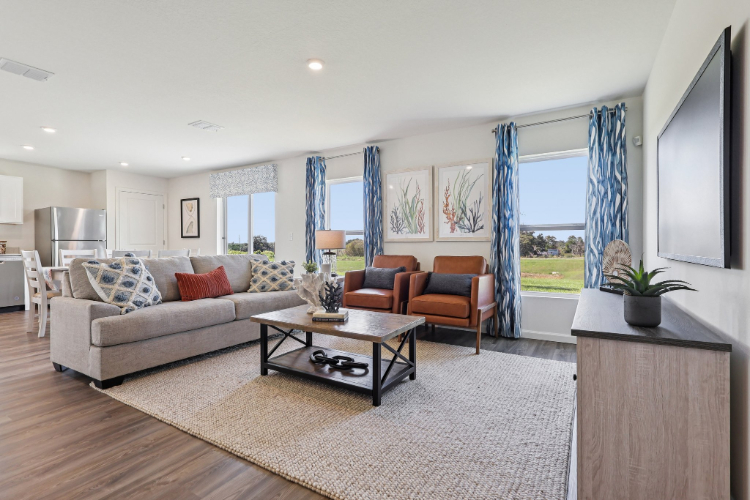A living room with a large window.