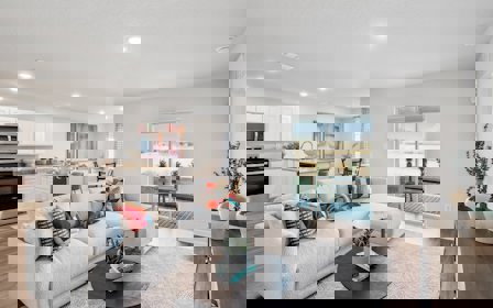 A living room with a large window.