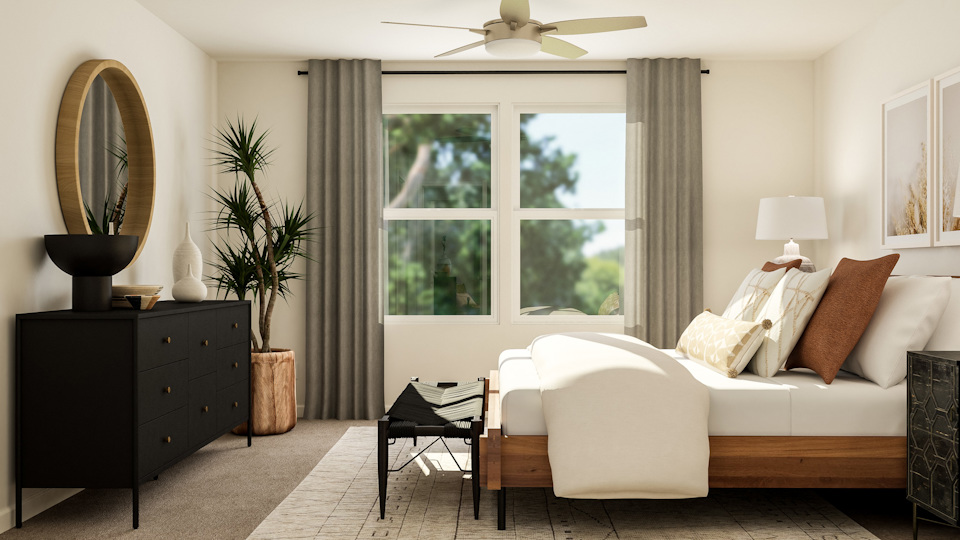 A living room with a couch and a chair.