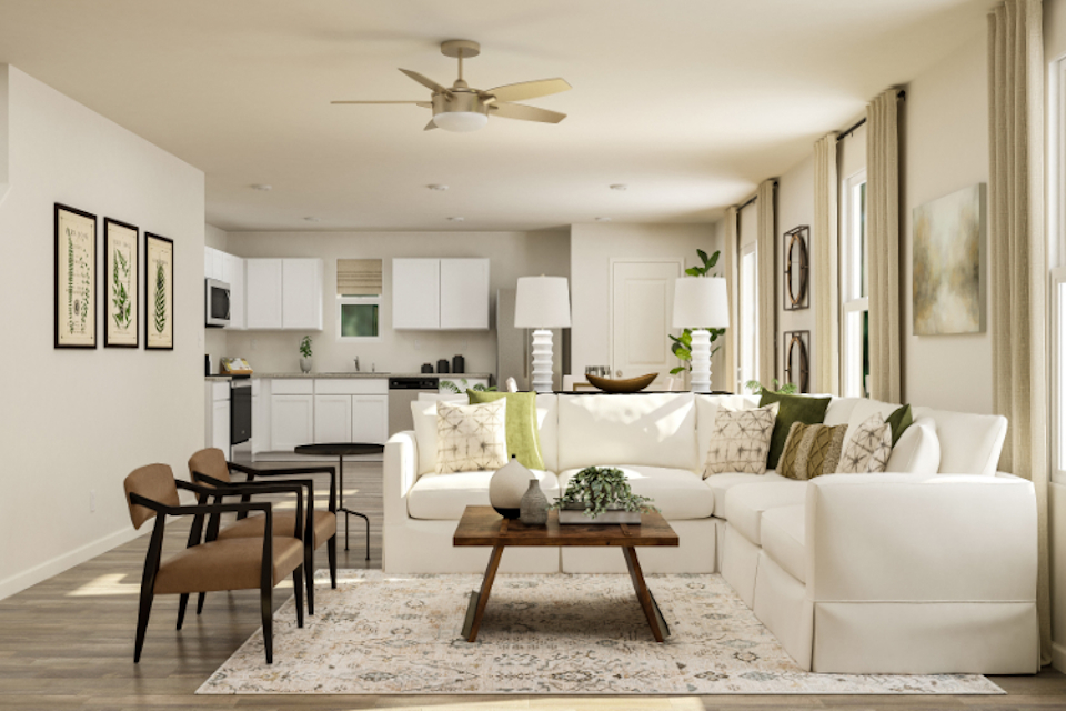 A living room with a white couch.