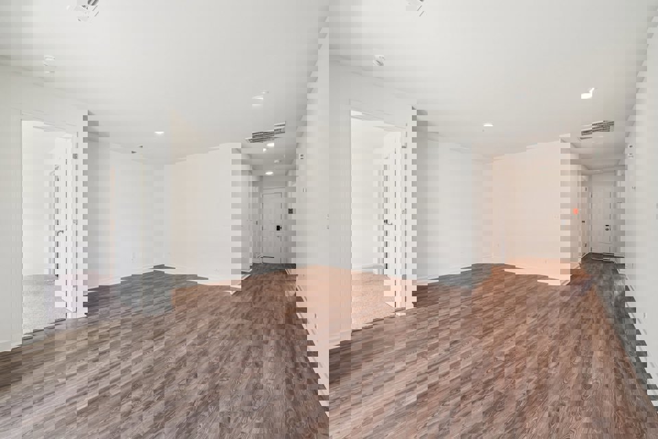 A room with wood floors.