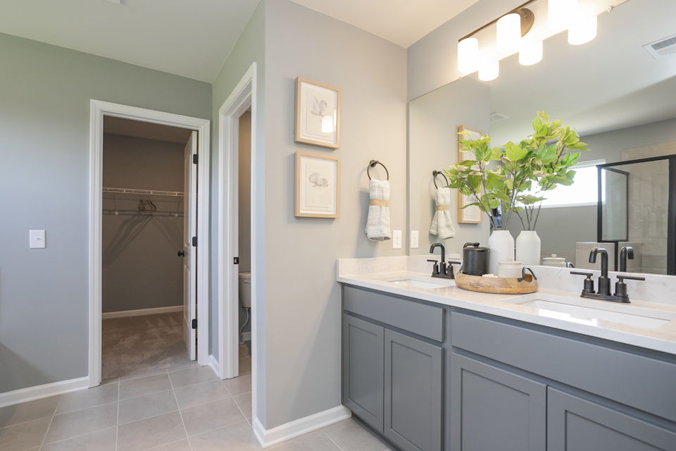A bathroom with a marble countertop.