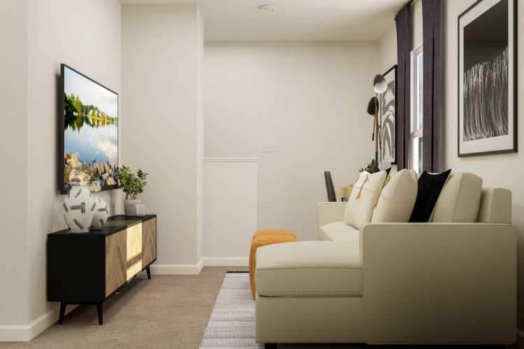 A living room with a white couch.