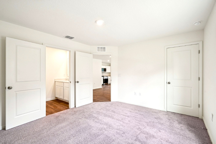 A room with white doors.