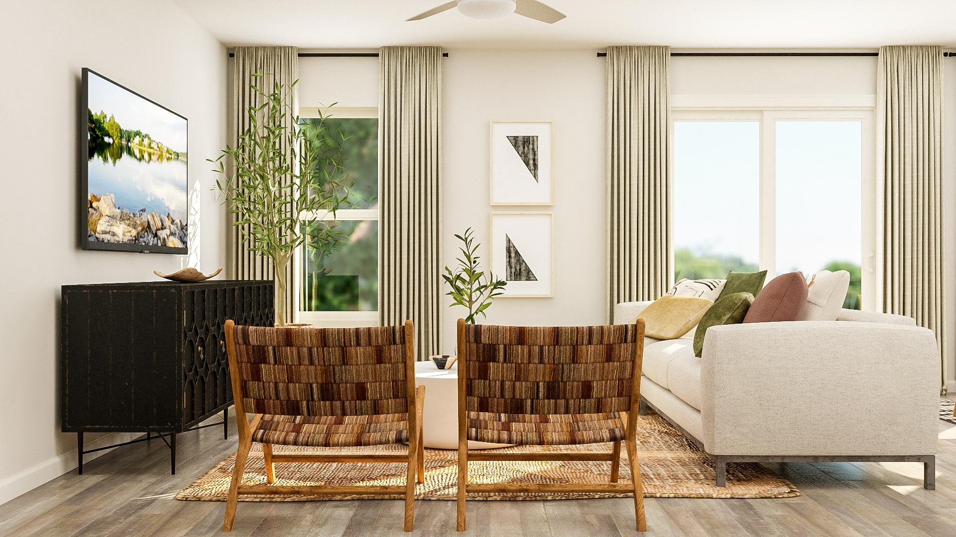 A living room with a couch and chairs.