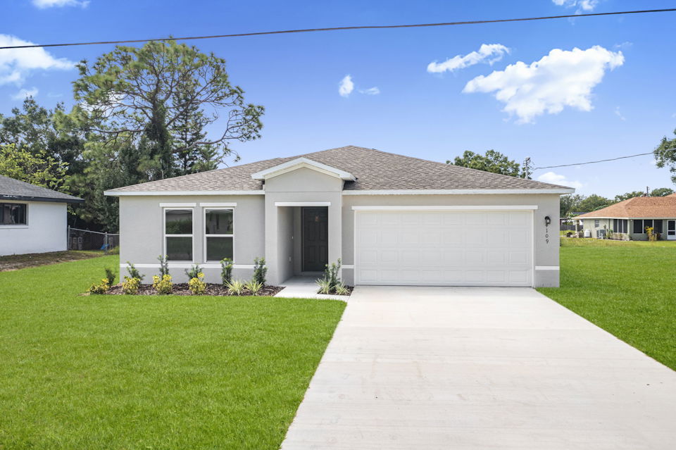 A house with a driveway.