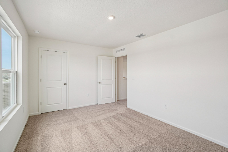 A room with white doors.