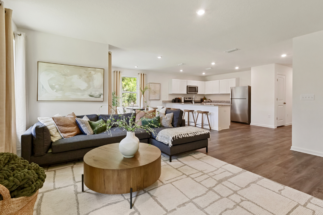 A living room with a couch and a coffee table.