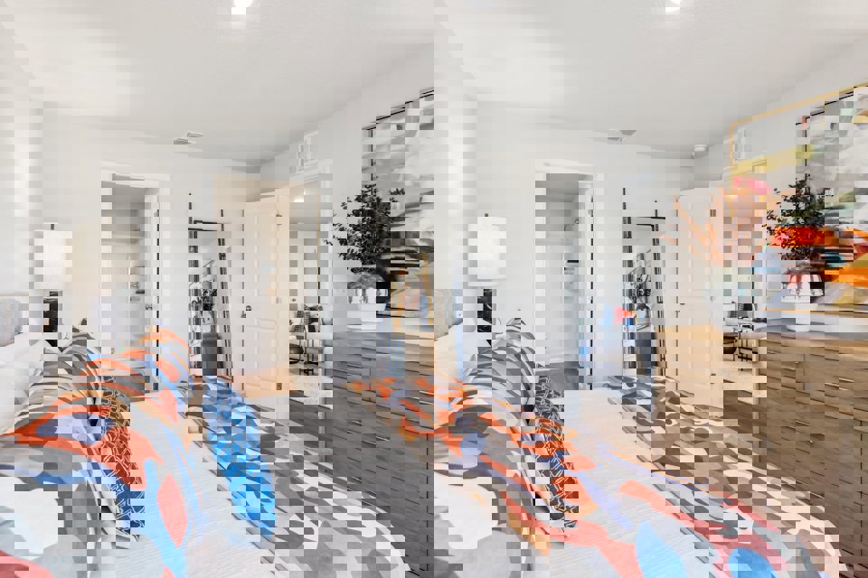 Owner's suite with attached bathroom and walk-in closet.