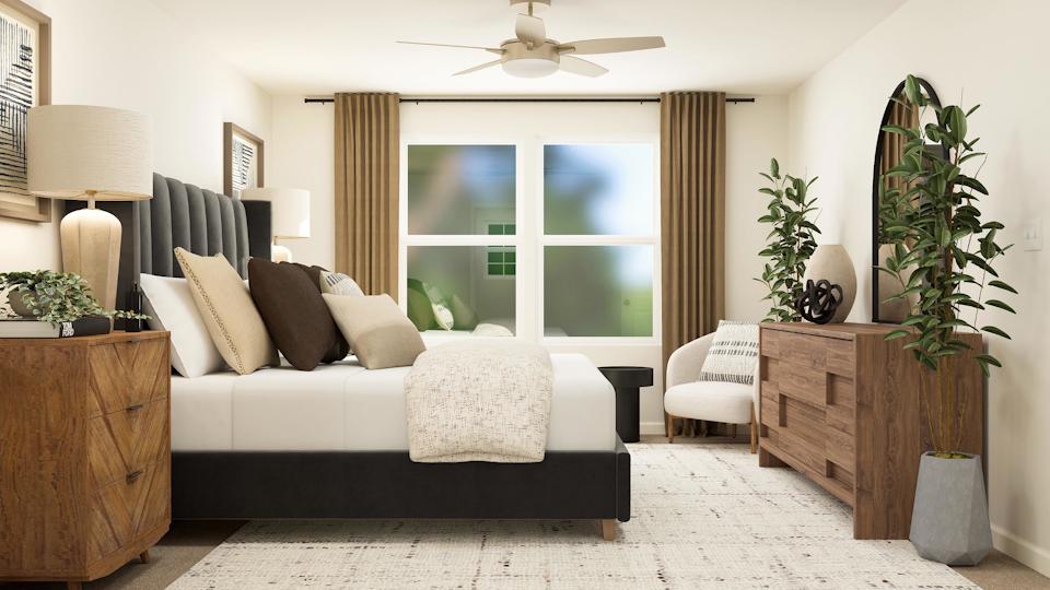 A living room with a couch and a table.