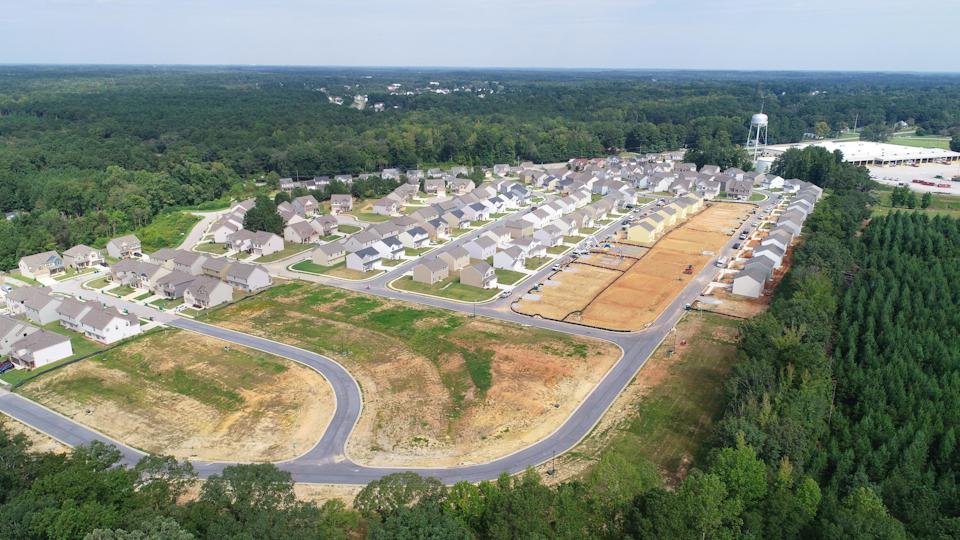 A large area with buildings and trees.