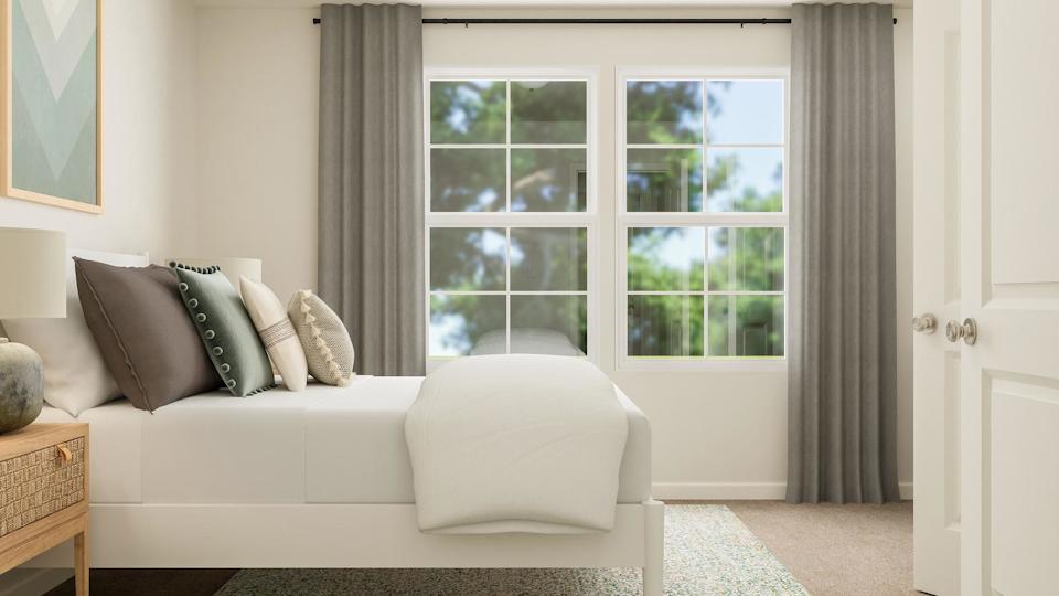 A white couch in a room.