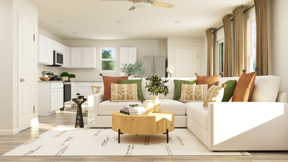 A living room with a white couch.