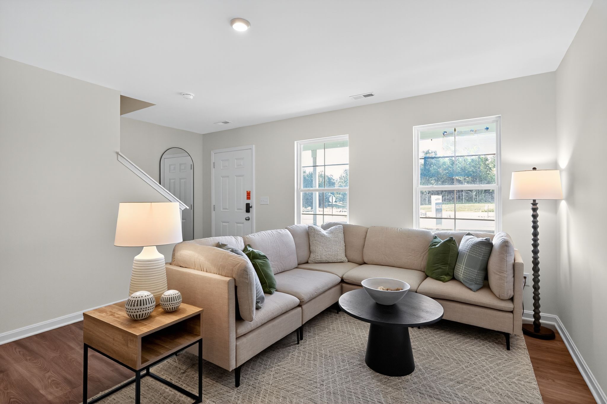 A living room with a couch and a coffee table.