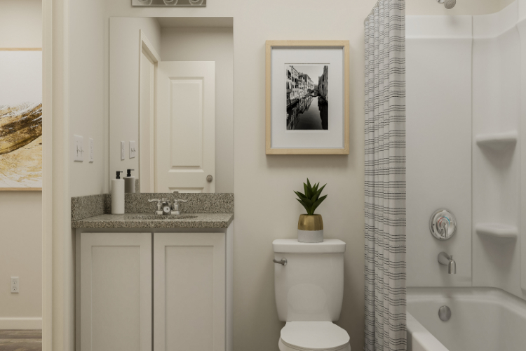 A bathroom with a toilet and sink.