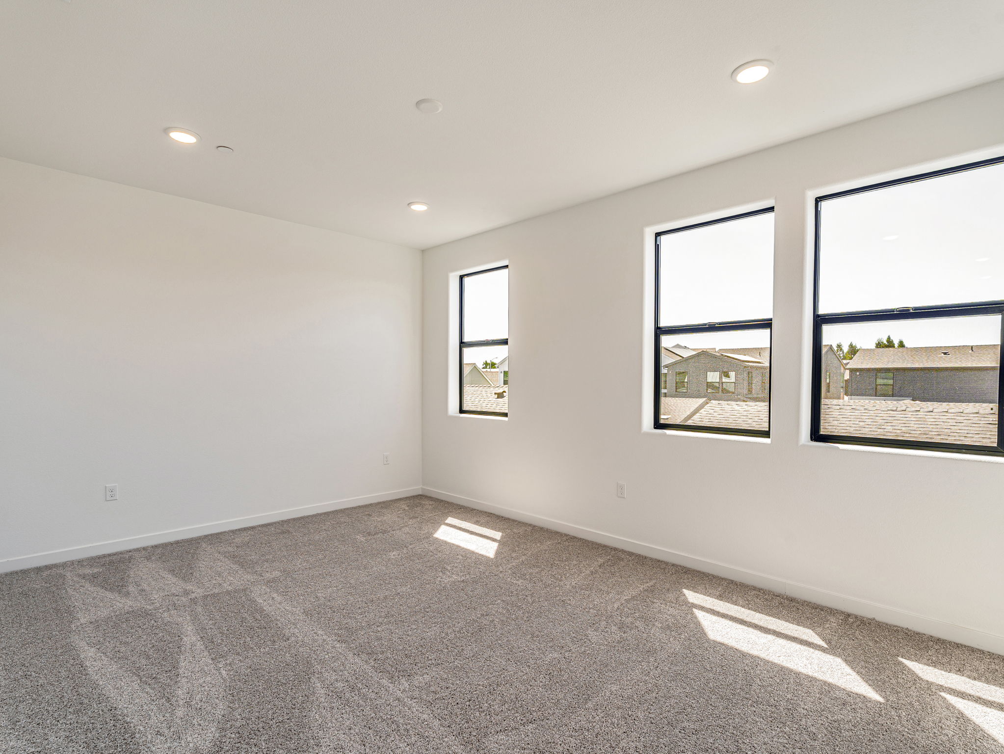 A room with a few windows.